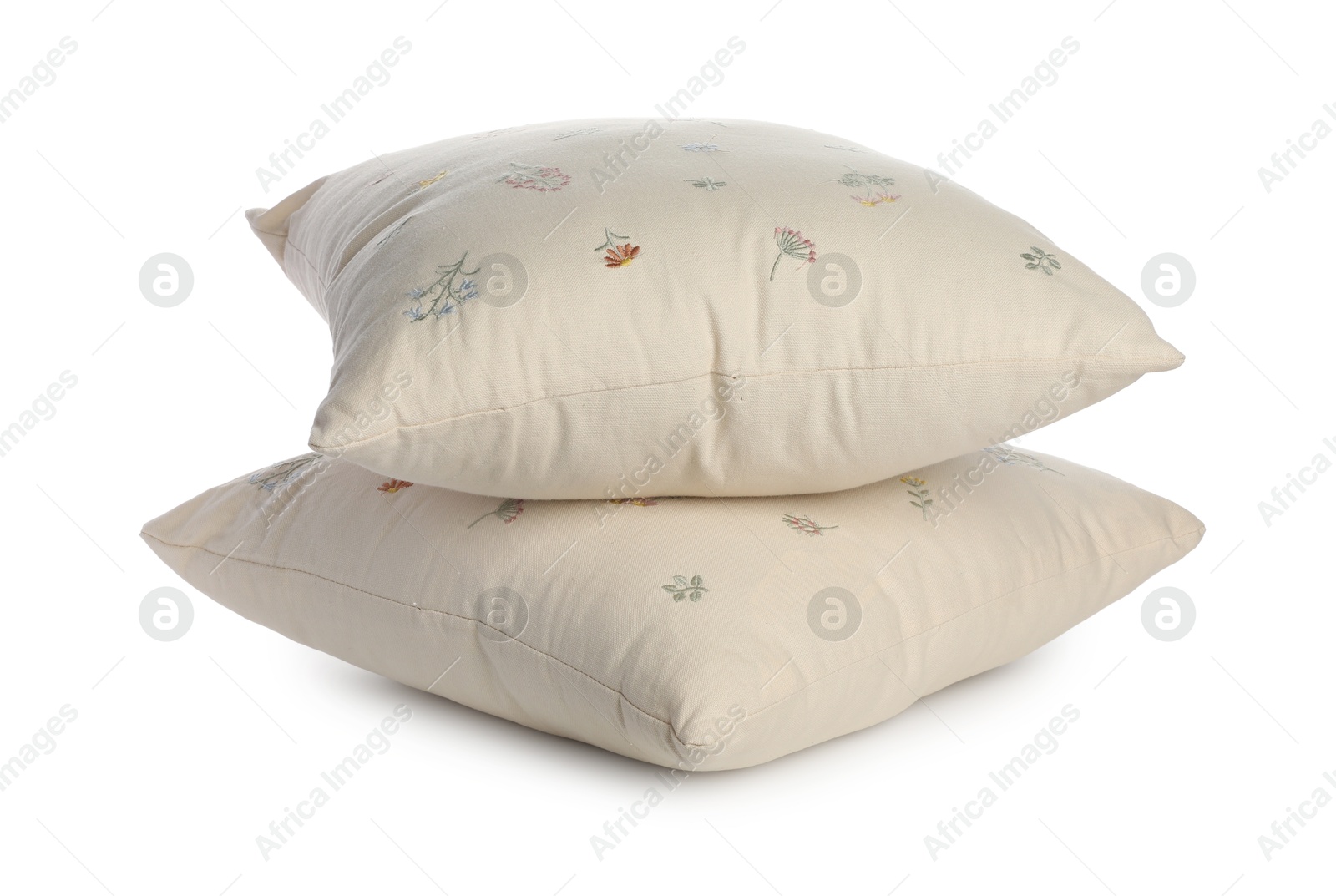 Photo of Two soft light pillows isolated on white