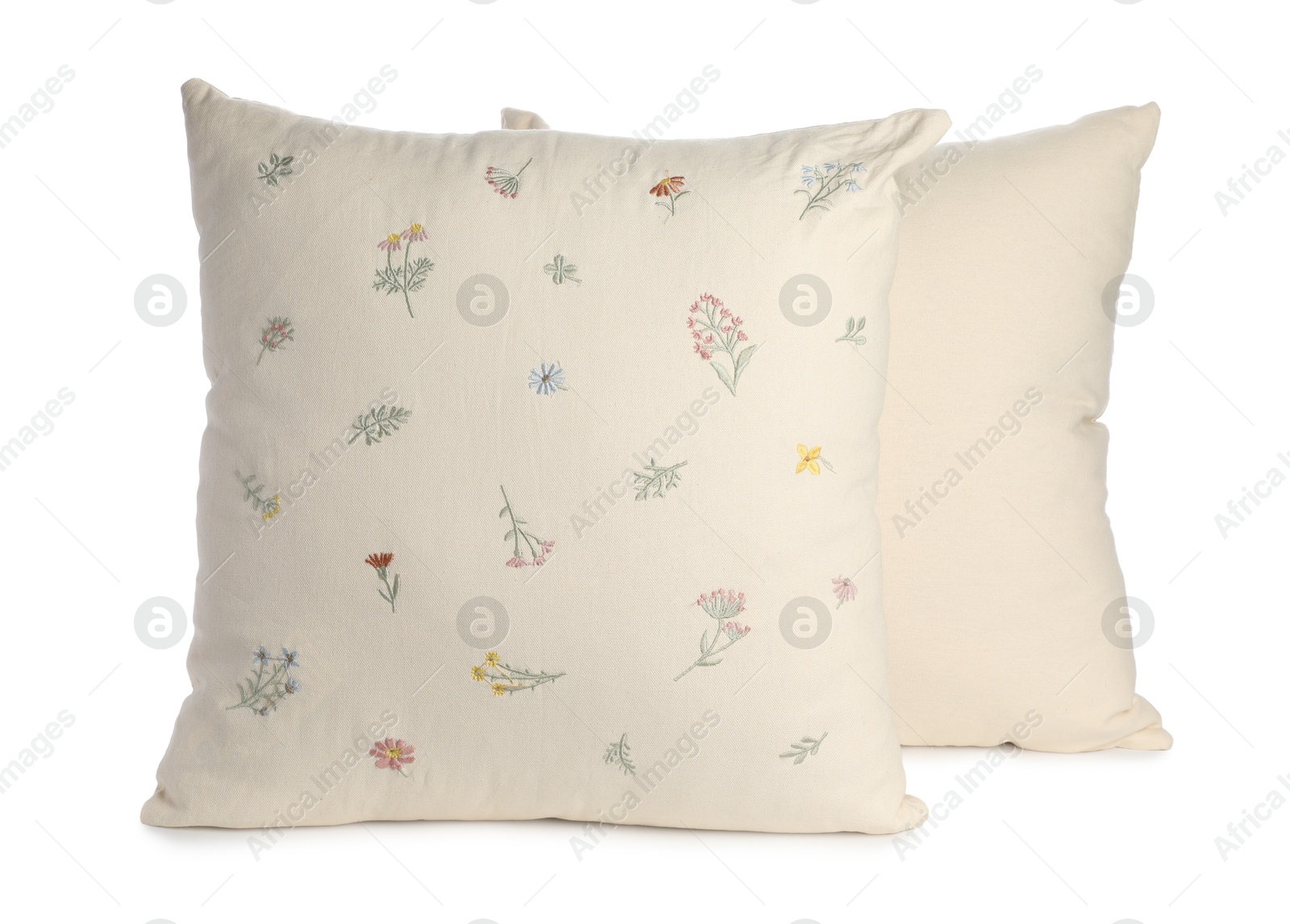 Photo of Two soft light pillows isolated on white