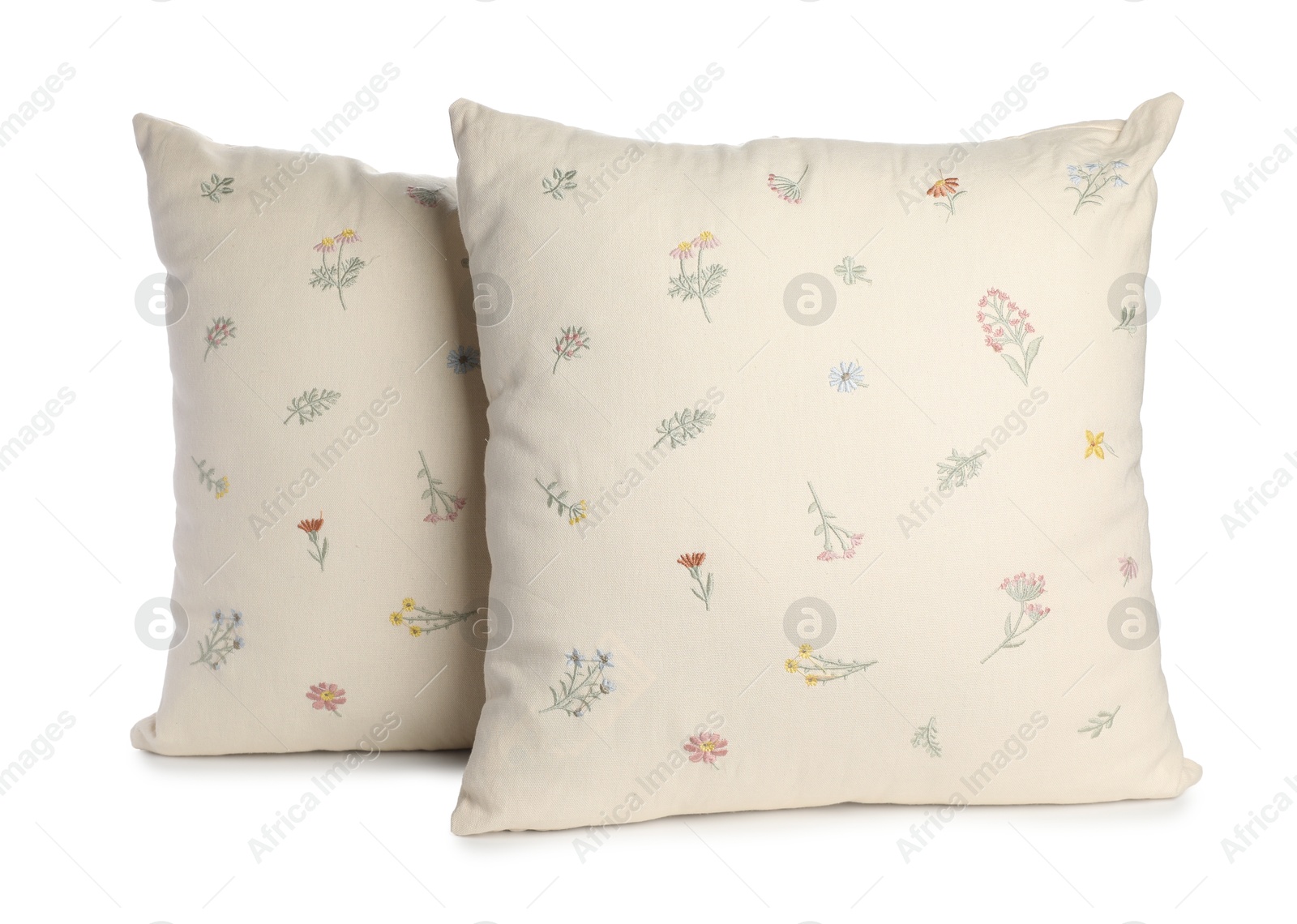 Photo of Two soft light pillows isolated on white