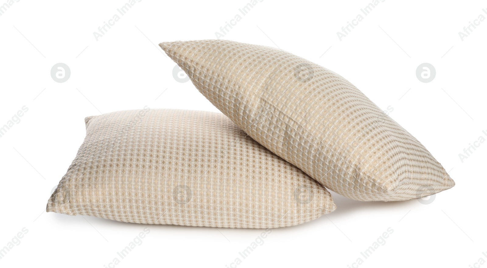 Photo of Two soft light pillows isolated on white