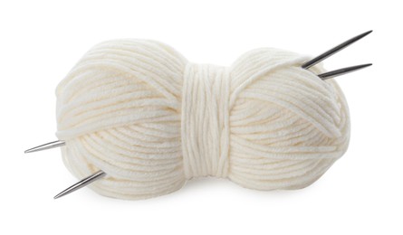 Photo of Skein of soft yarn and knitting needles isolated on white