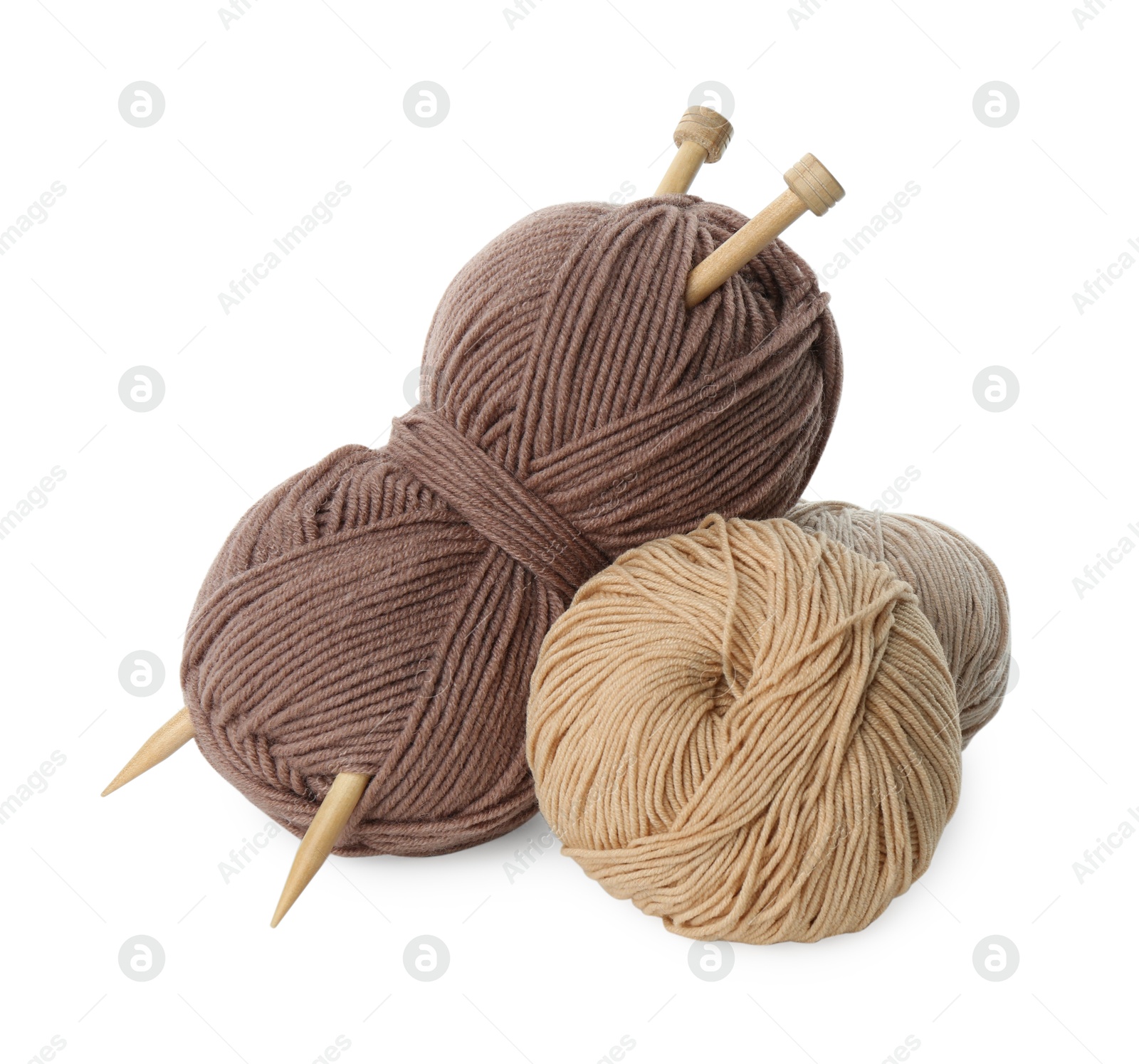 Photo of Skeins of soft yarn and knitting needles isolated on white