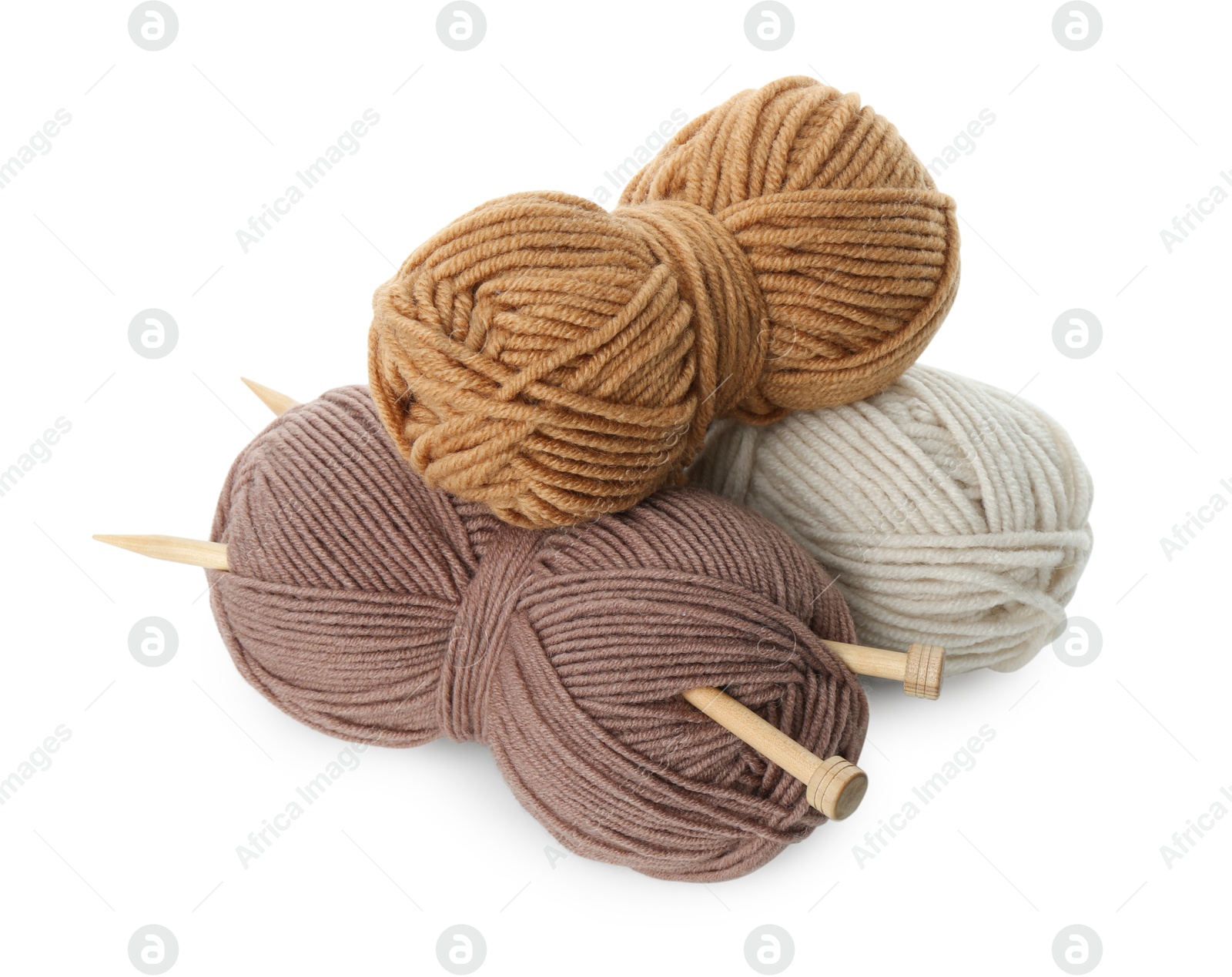 Photo of Skeins of soft yarn and knitting needles isolated on white