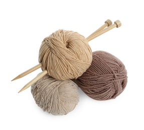 Photo of Skeins of soft yarn and knitting needles isolated on white