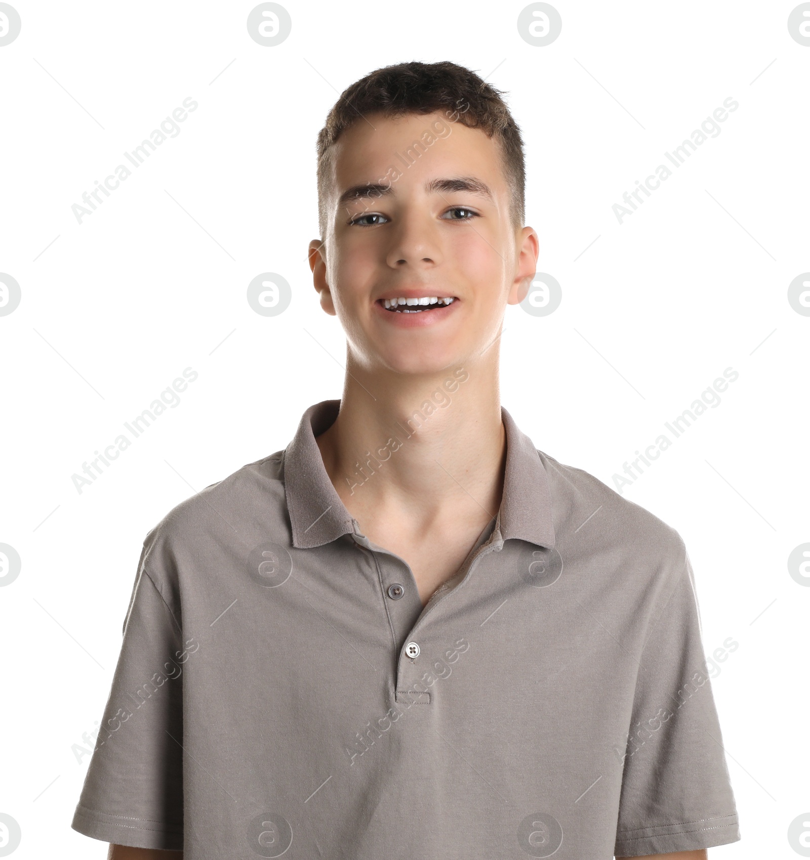 Photo of Portrait of teenage boy on white background