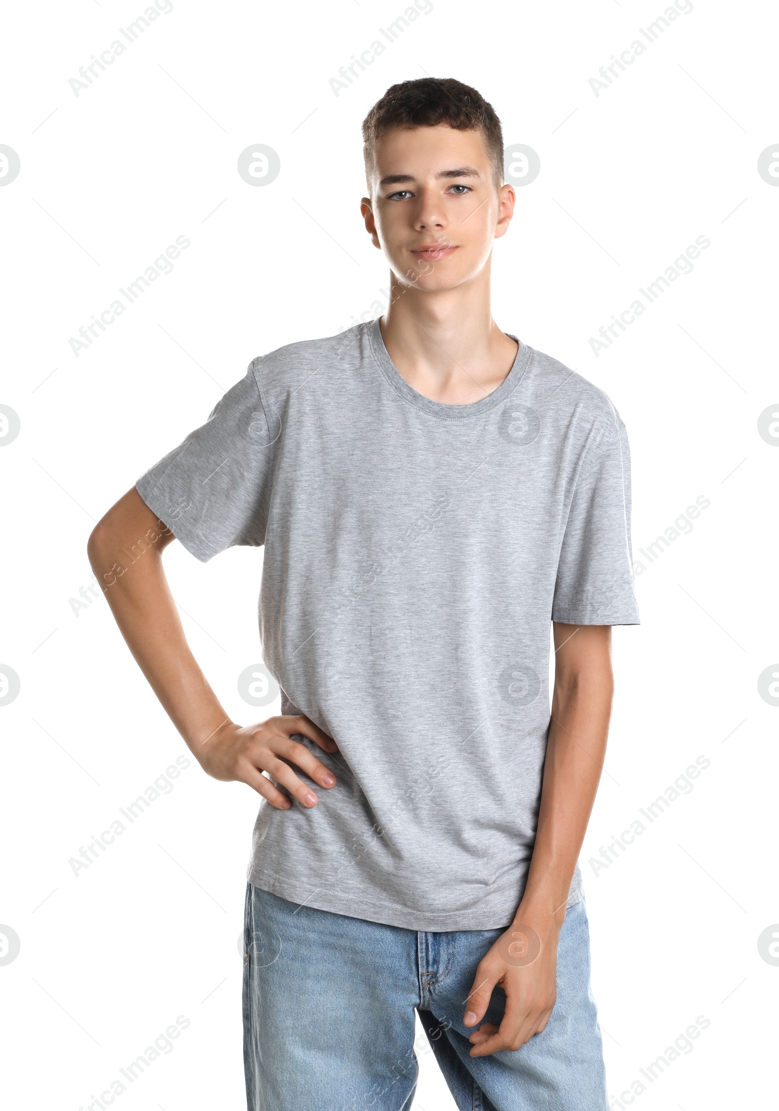 Photo of Portrait of teenage boy on white background