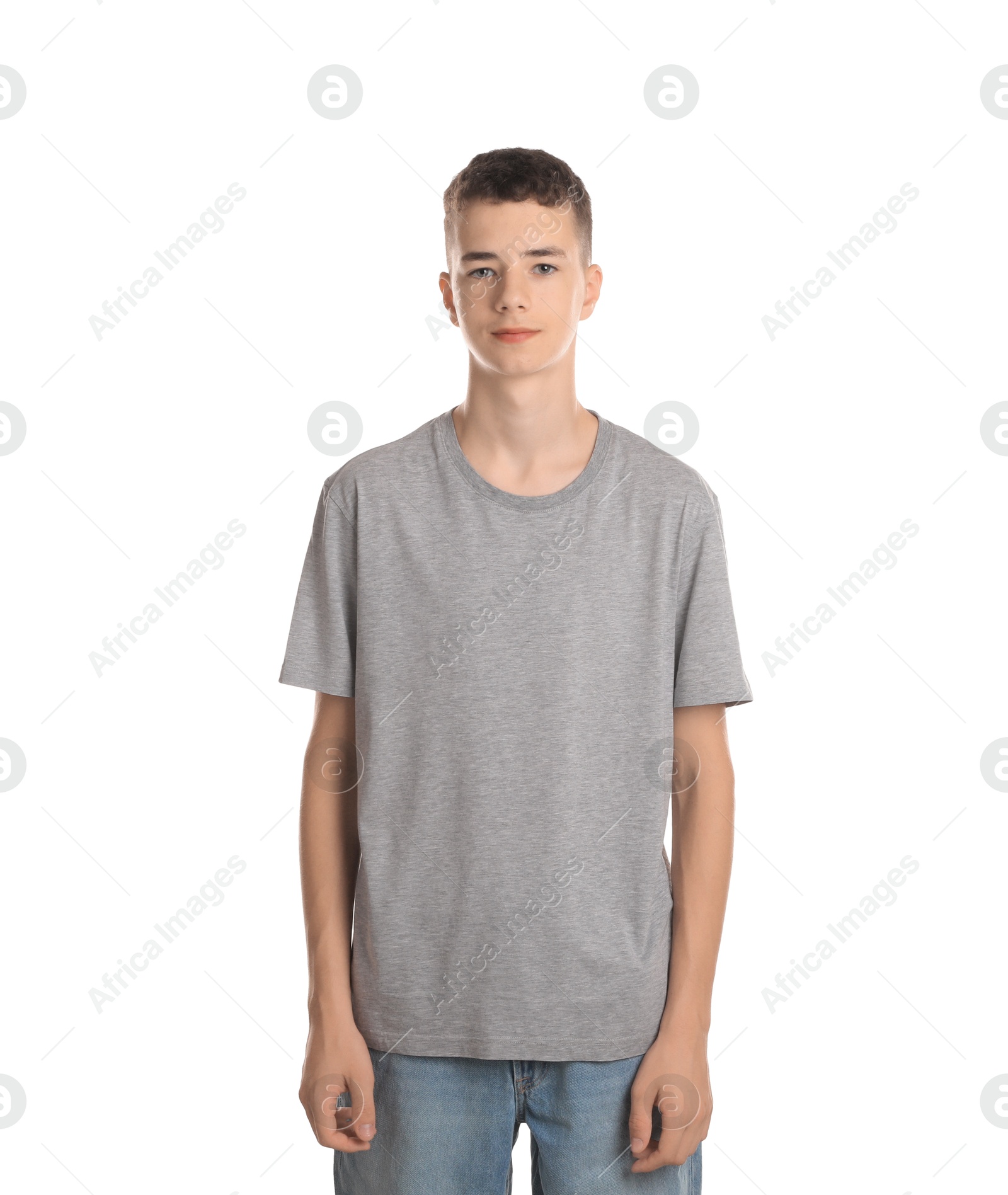 Photo of Portrait of teenage boy on white background