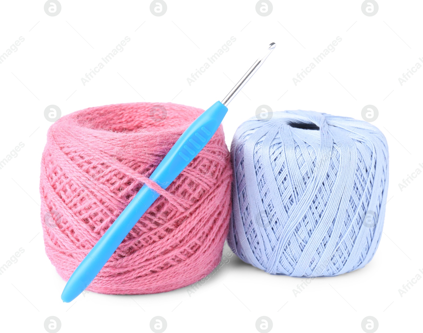 Photo of Threads of colorful yarns and crochet hook isolated on white