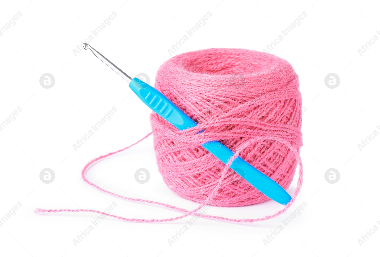 Photo of Thread of pink yarn and crochet hook isolated on white