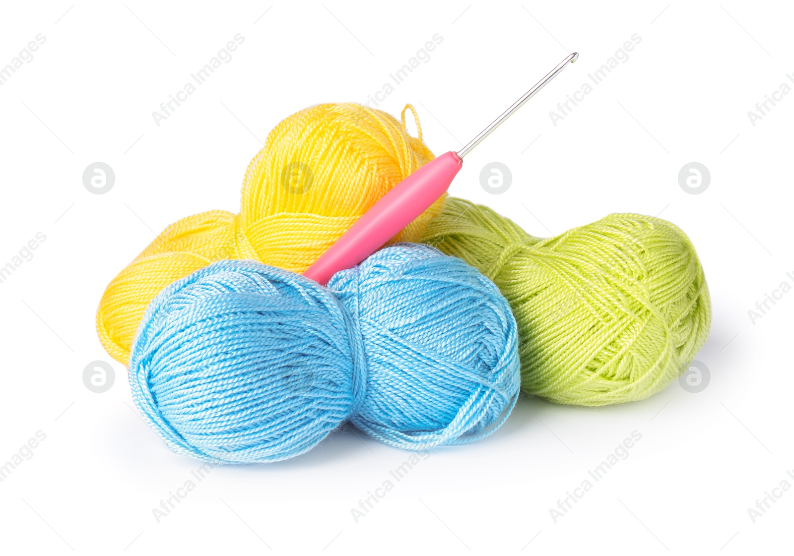 Photo of Many colorful yarns and crochet hook isolated on white