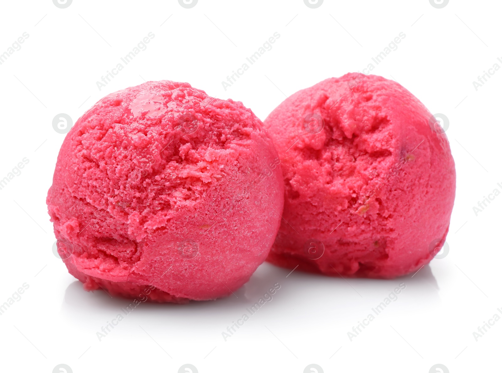 Photo of Scoops of delicious sorbet isolated on white