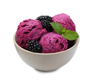 Delicious blackberry sorbet, mint and fresh berries isolated on white