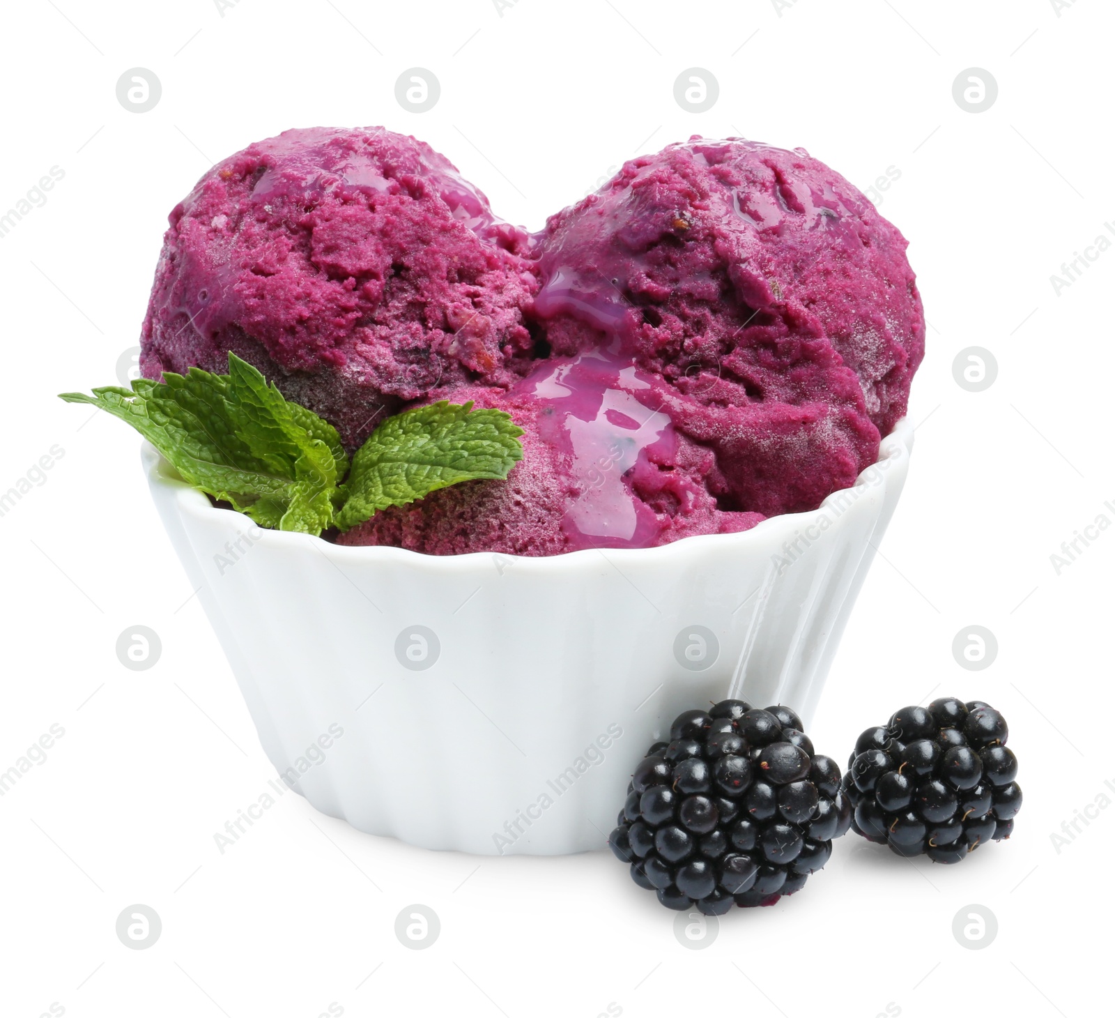 Photo of Delicious blackberry sorbet, mint and fresh berries isolated on white