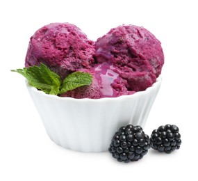 Photo of Delicious blackberry sorbet, mint and fresh berries isolated on white