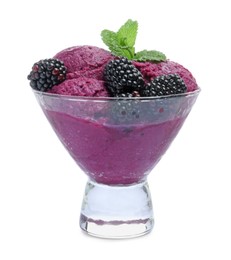 Photo of Delicious blackberry sorbet, fresh berries and mint in glass dessert bowl isolated on white