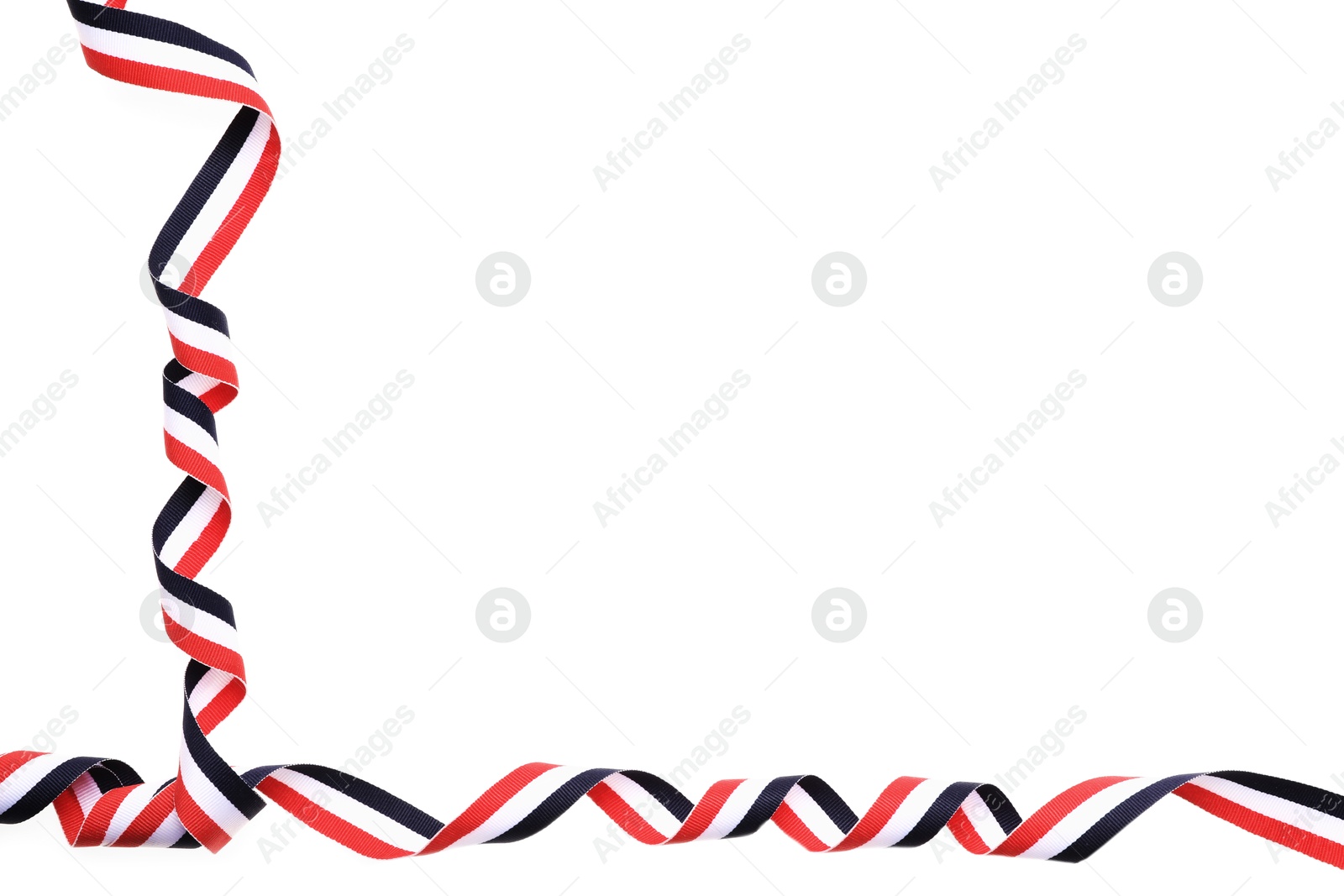 Photo of Ribbon in colors of Yemeni flag isolated on white, top view