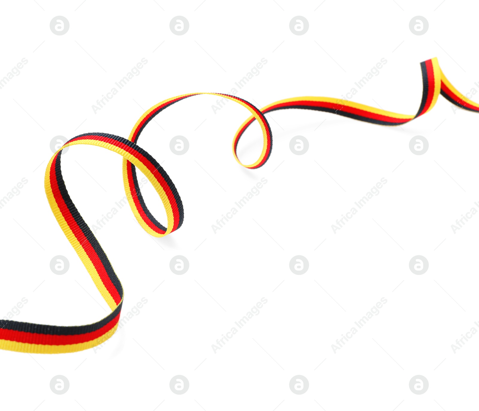 Photo of Ribbon in colors of German flag isolated on white