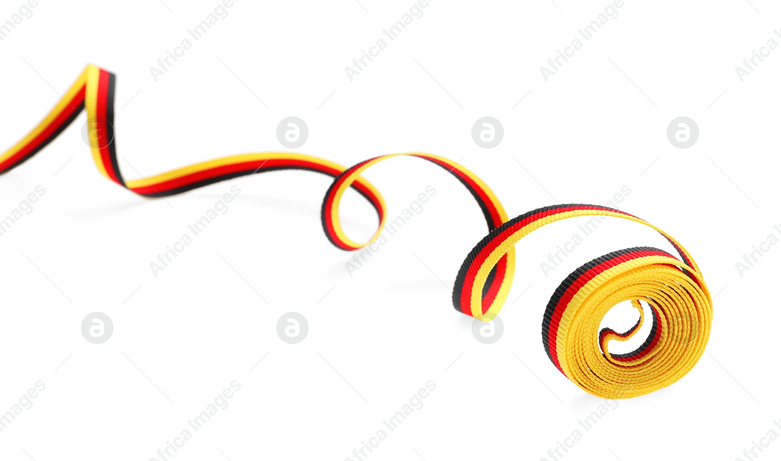 Photo of Ribbon in colors of German flag isolated on white