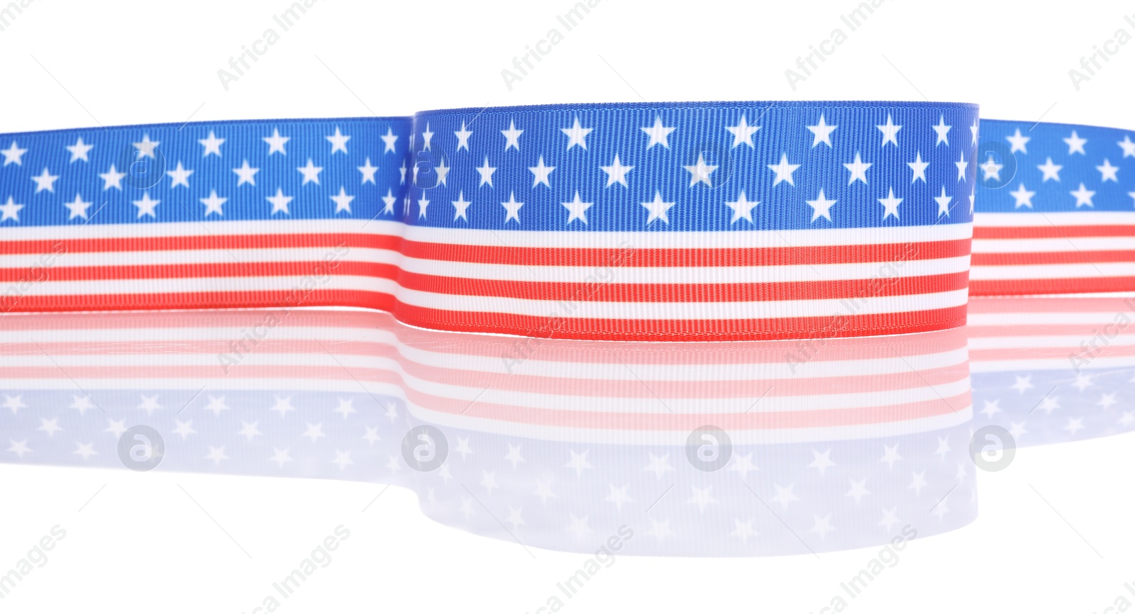 Photo of Ribbon in colors of American flag isolated on white