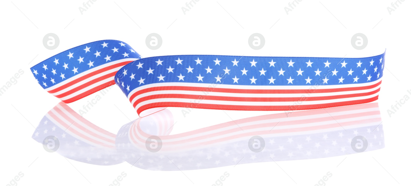 Photo of Ribbon in colors of American flag isolated on white