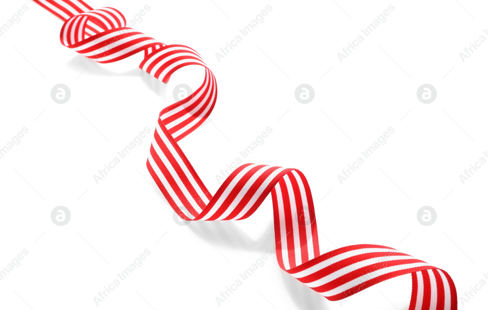 Photo of One bright striped ribbon isolated on white