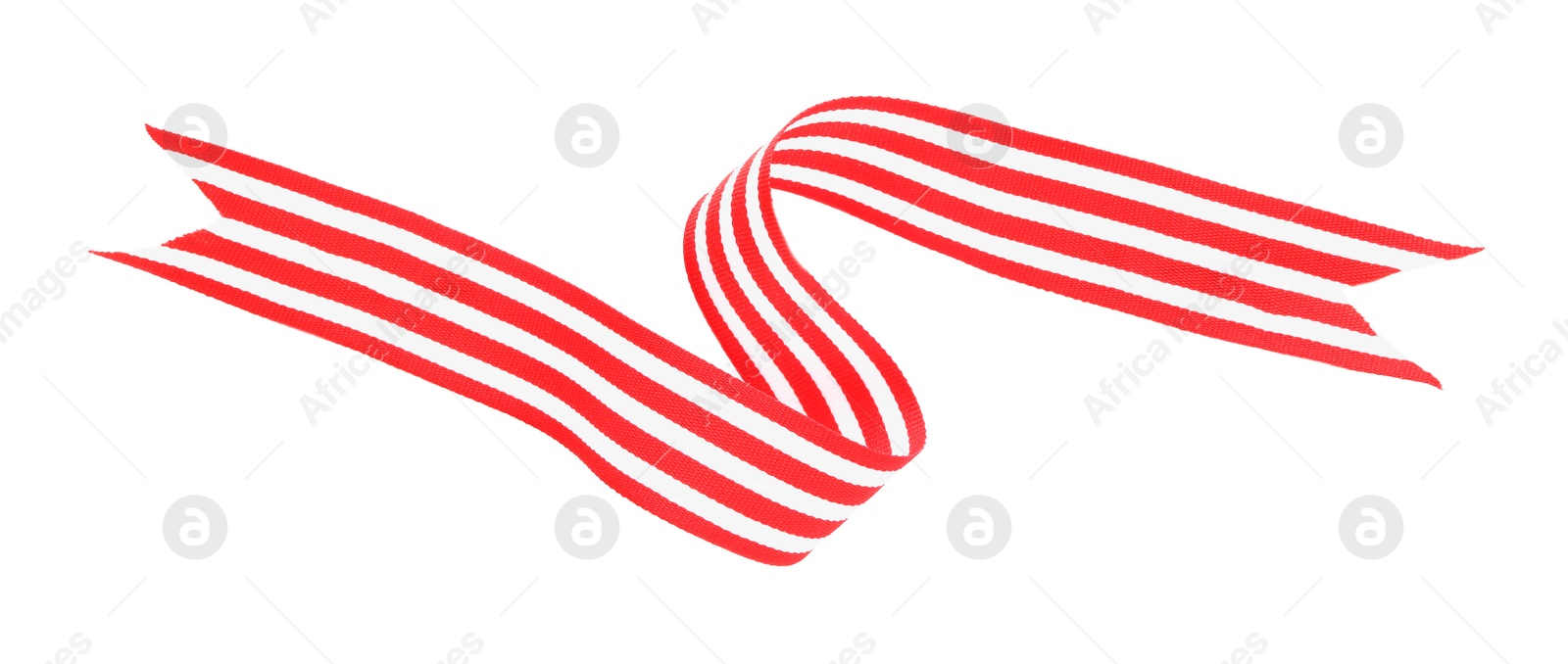 Photo of One striped ribbon isolated on white, top view