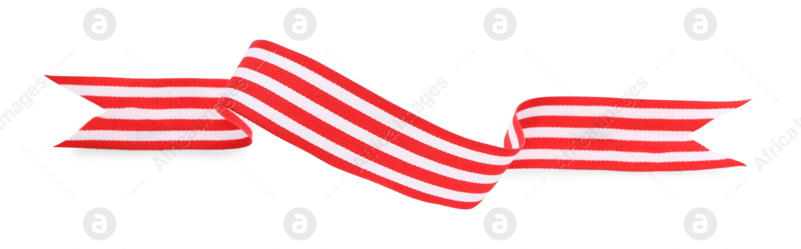 Photo of One striped ribbon isolated on white, top view