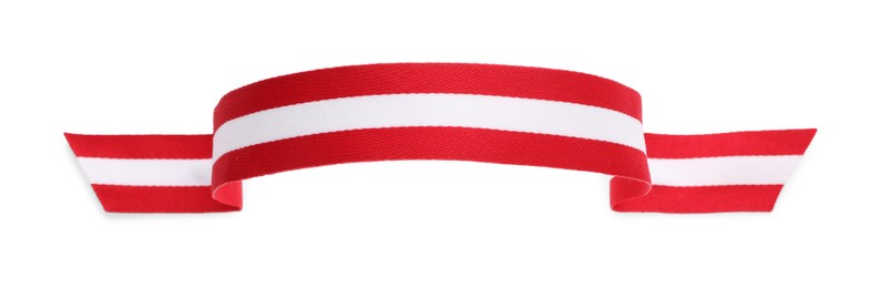 Ribbon in colors of Austrian flag isolated on white, top view