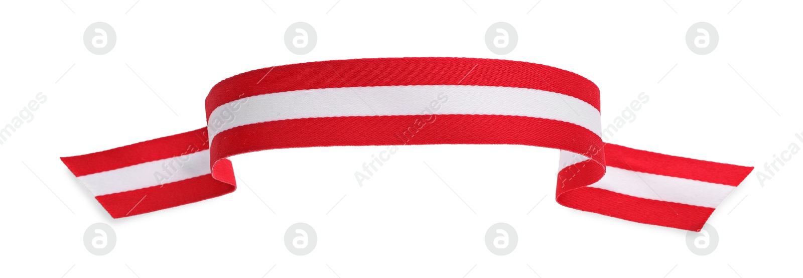 Photo of Ribbon in colors of Austrian flag isolated on white, top view