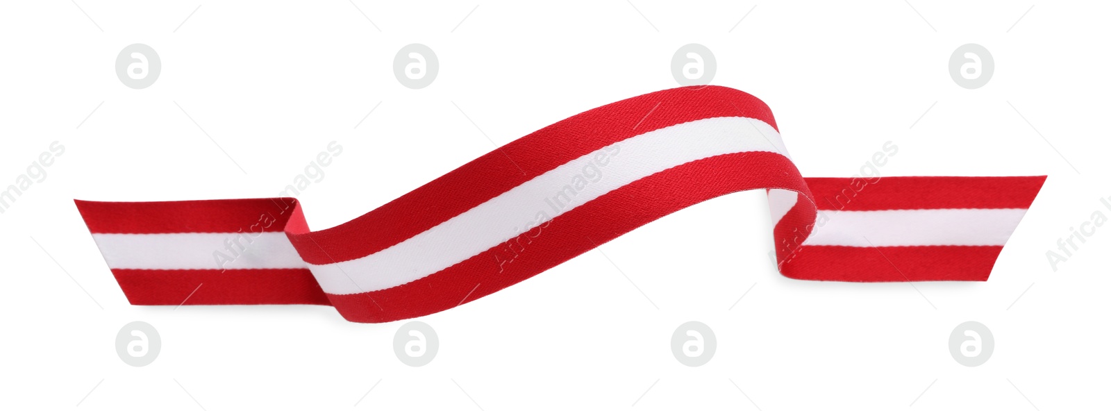 Photo of Ribbon in colors of Austrian flag isolated on white, top view