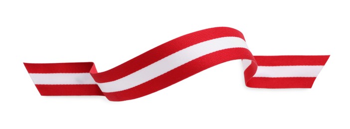 Ribbon in colors of Austrian flag isolated on white, top view