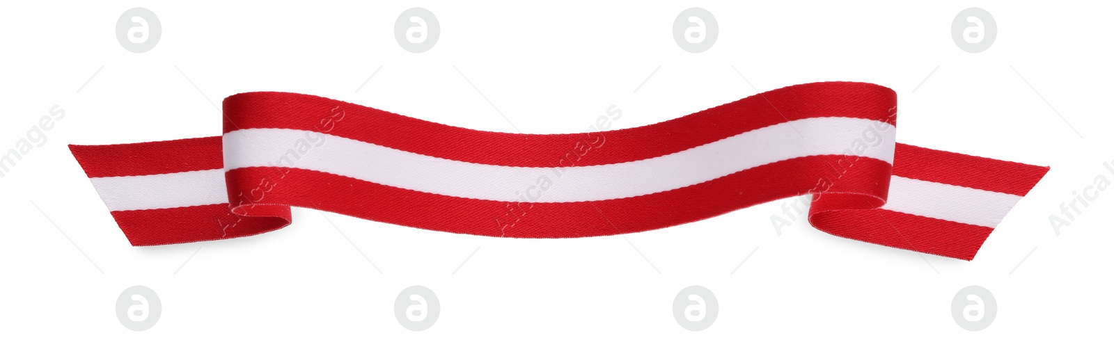 Photo of Ribbon in colors of Austrian flag isolated on white, top view