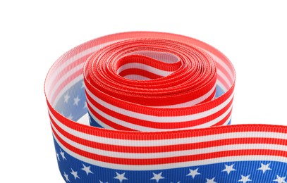 Photo of Roll with ribbon in colors of American flag isolated on white