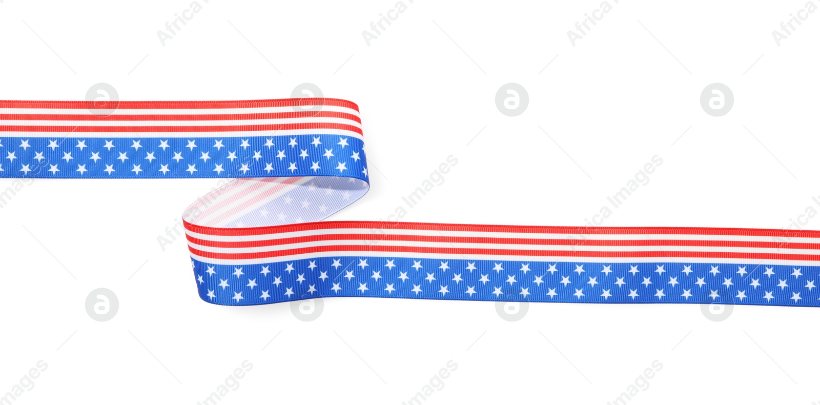 Photo of Ribbon in colors of American flag isolated on white, top view