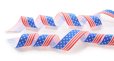 Photo of Ribbons in colors of American flag on white background\