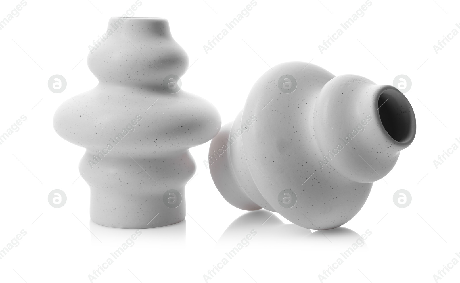 Photo of Two beautiful ceramic vases isolated on white