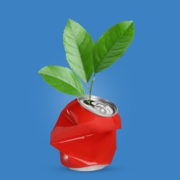 Image of Seedling with green leaves growing from crumpled can on blue background. Recycling