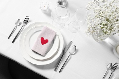 Image of Table setting for romantic Valentine's day celebration, top view