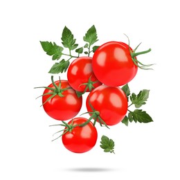 Image of Fresh tomatoes with green leaves falling on white background