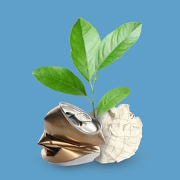 Seedling with leaves growing from crumpled can and paper ball on light blue background. Recycling