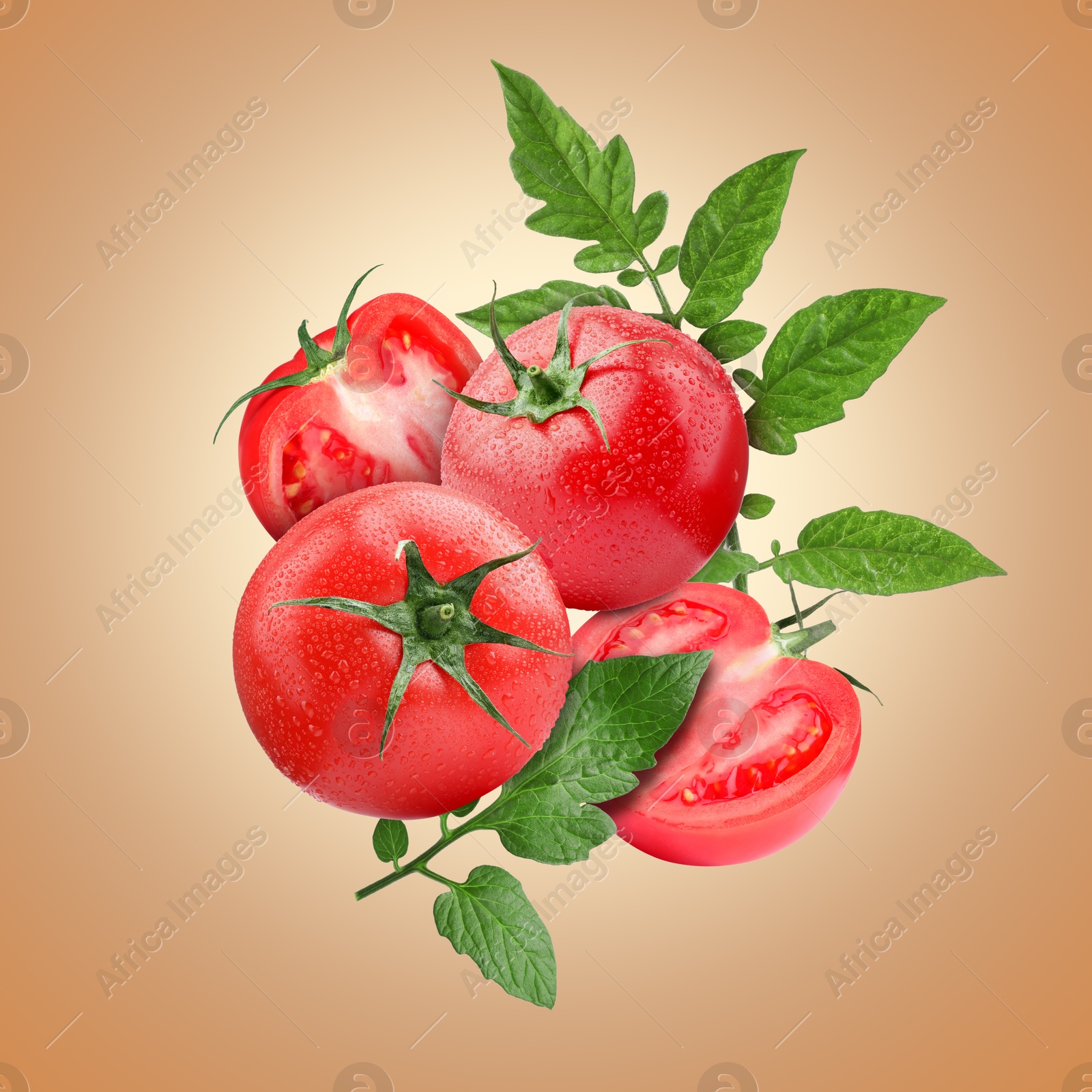 Image of Fresh tomatoes with green leaves in air on dark beige background