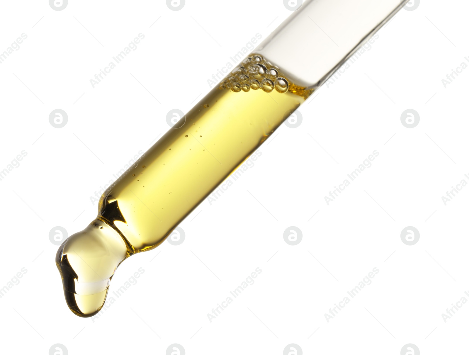 Photo of Essential oil dripping from pipette against white background