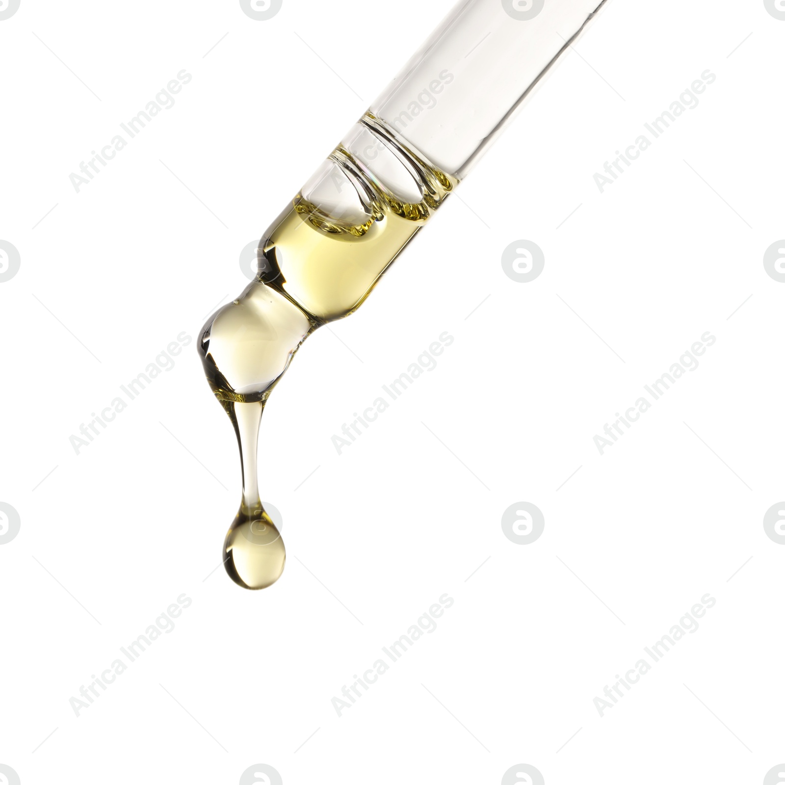 Photo of Essential oil dripping from pipette against white background