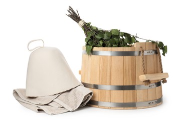 Photo of Sauna equipment. Wooden bucket, birch whisk, felt wool hat and towel isolated on white