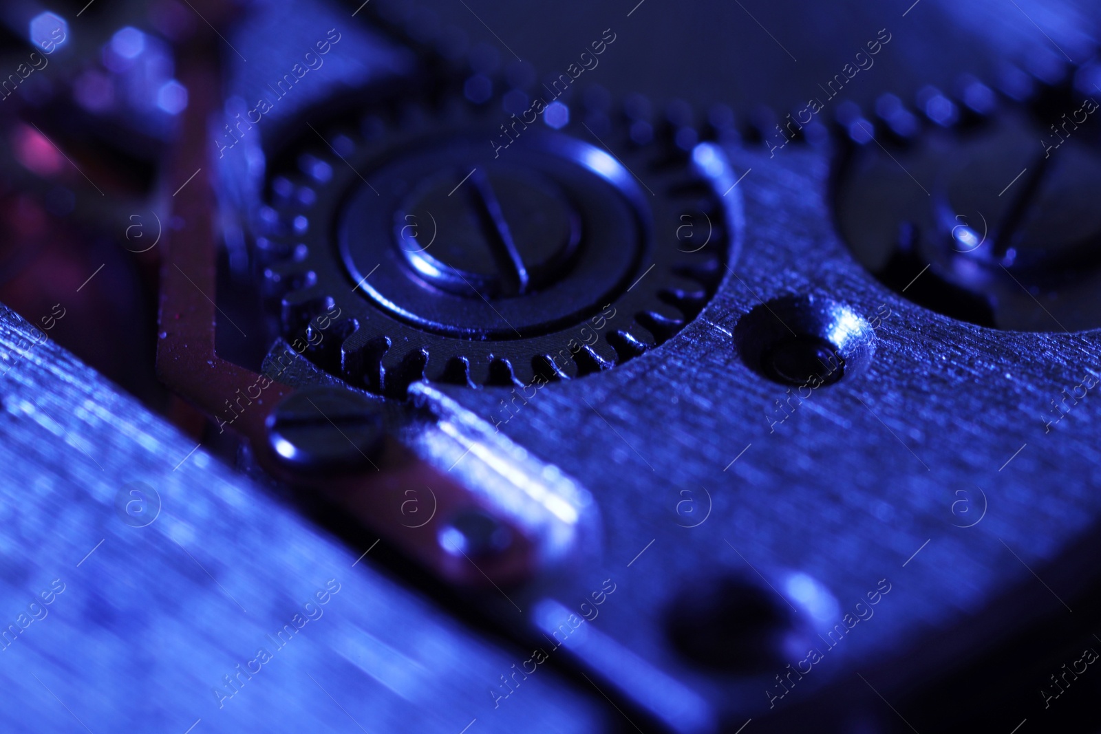 Photo of Mechanism of vintage wrist watch as background, closeup