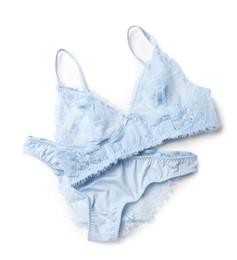 Elegant light blue lace women's underwear isolated on white, top view