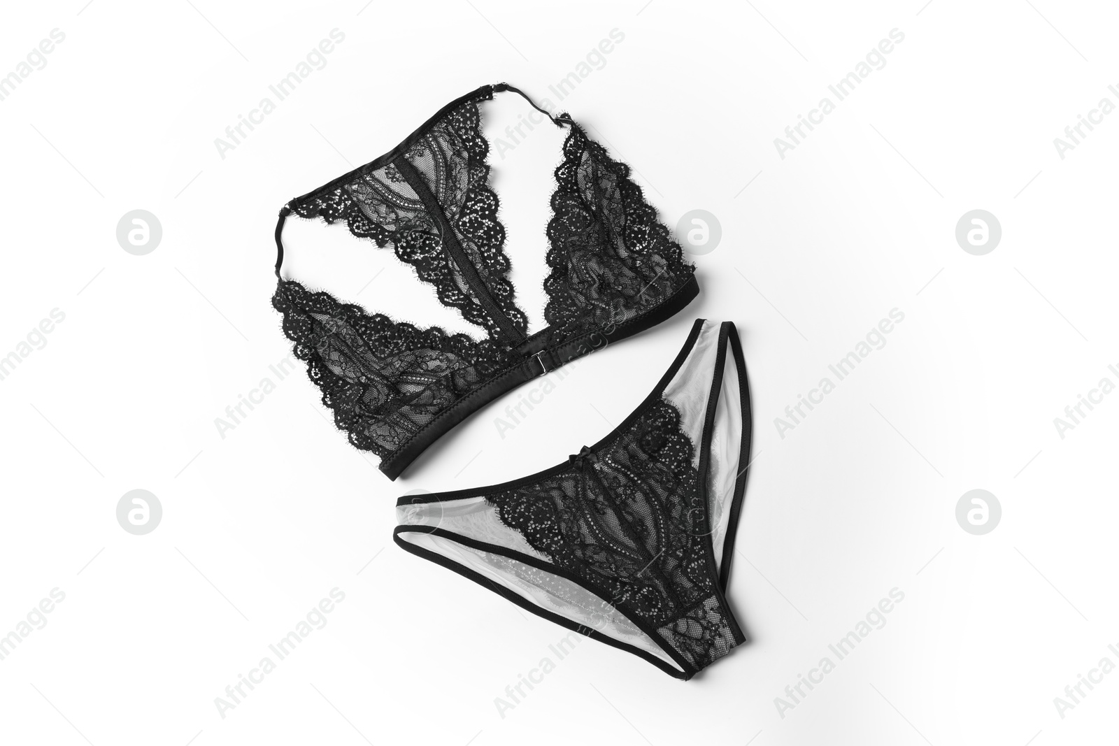 Photo of Elegant black lace women's underwear on white background, top view