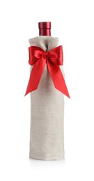 Photo of Wine bottle in burlap package with red ribbon isolated on white