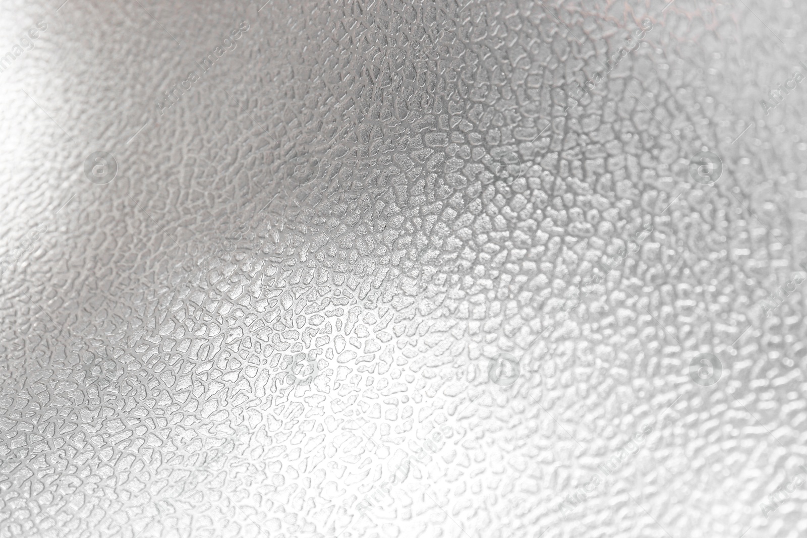 Photo of Shiny silver surface as background, closeup view