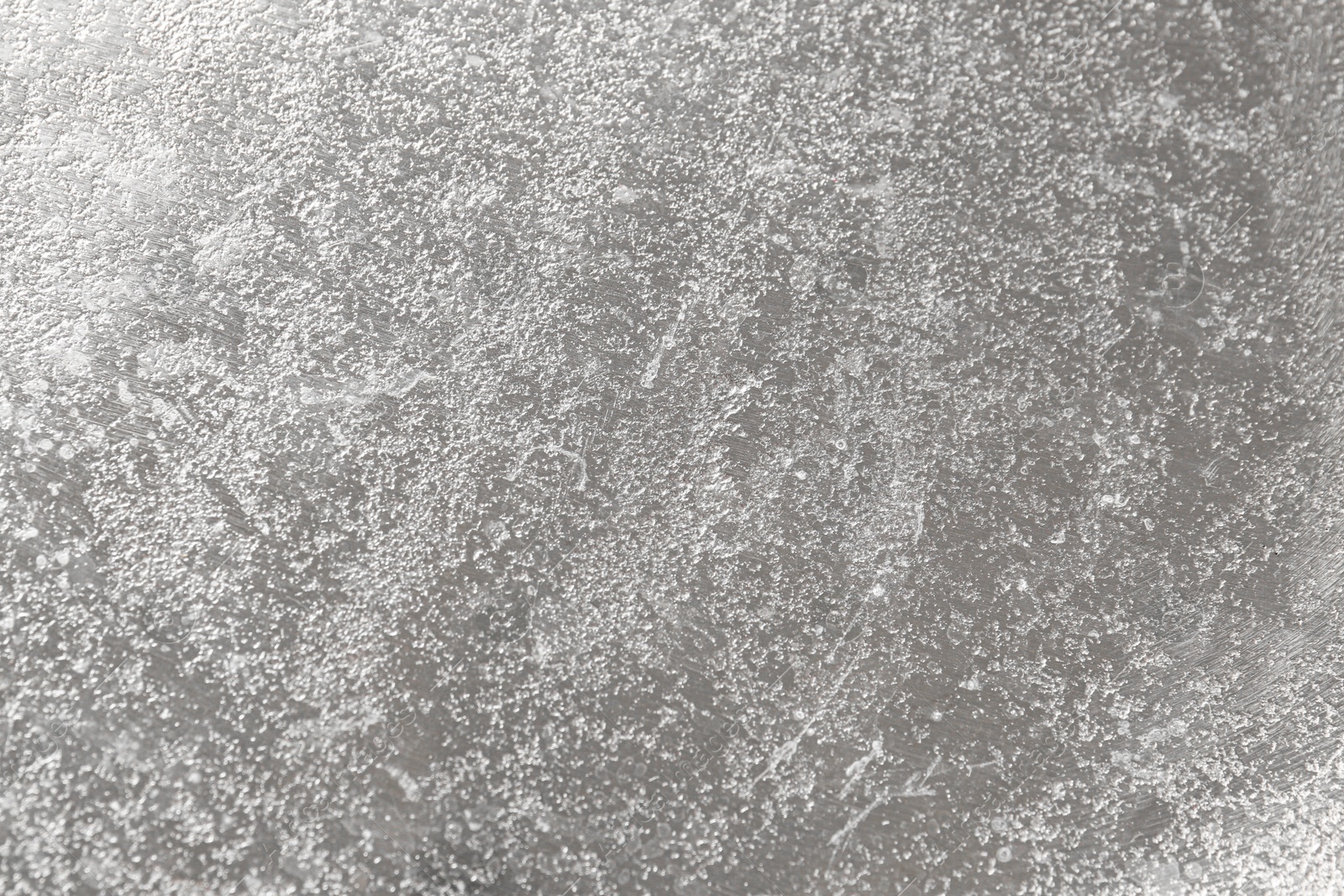 Photo of Shiny silver surface as background, top view